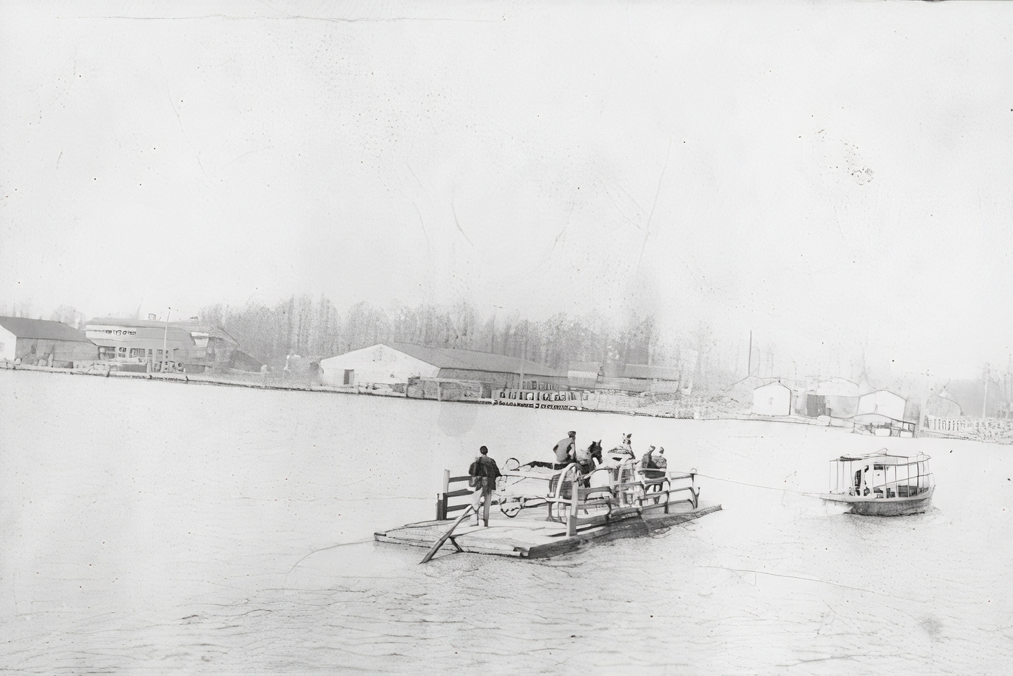 Historic ferry crossing with Dunn Bros. warehouse in the background